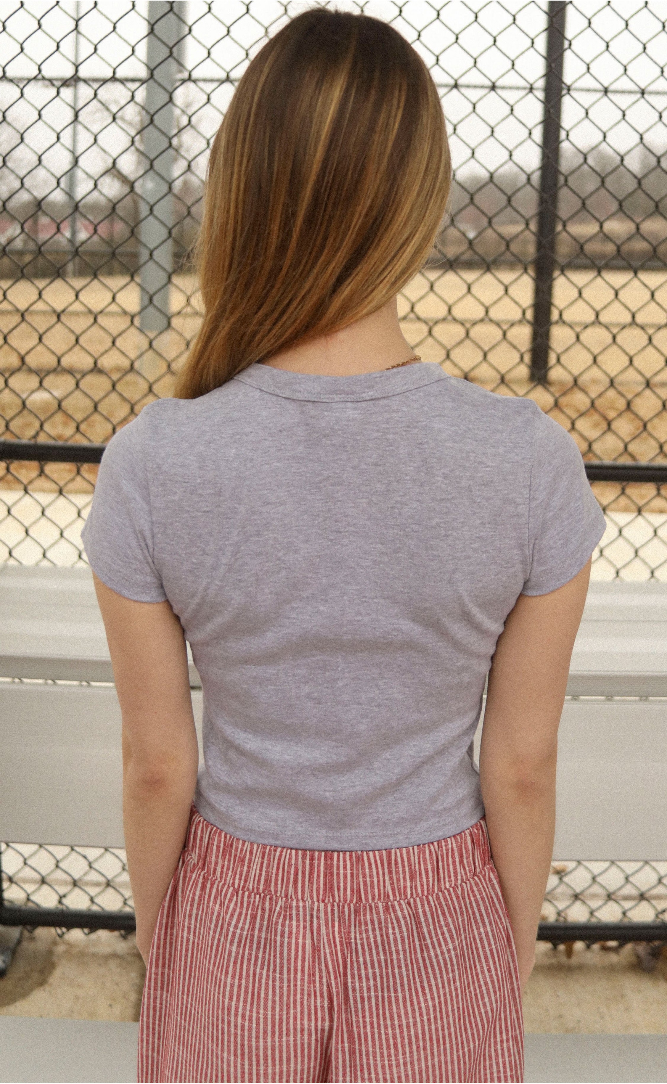 Hogs Baby Tee – Soft Grey Essential for Your Little Razorback Fan